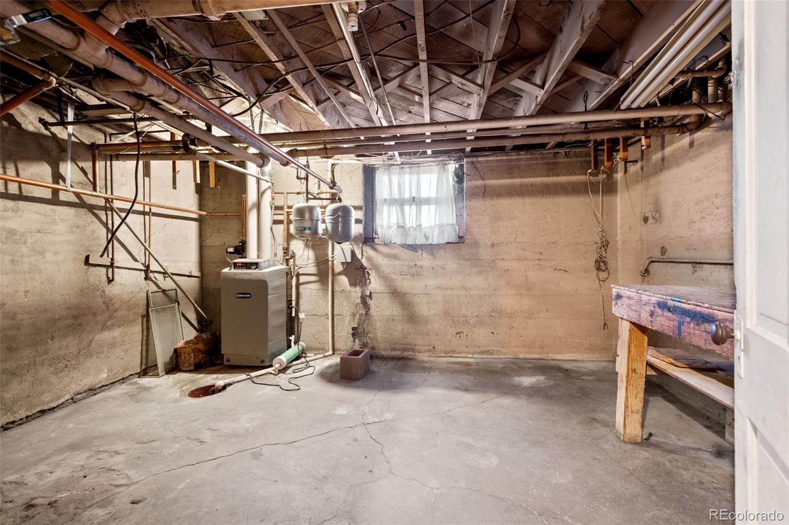 303 South 3rd Street Sterling, CO 80751 - Photo 44 of 50 a view of a room with racks on the wall