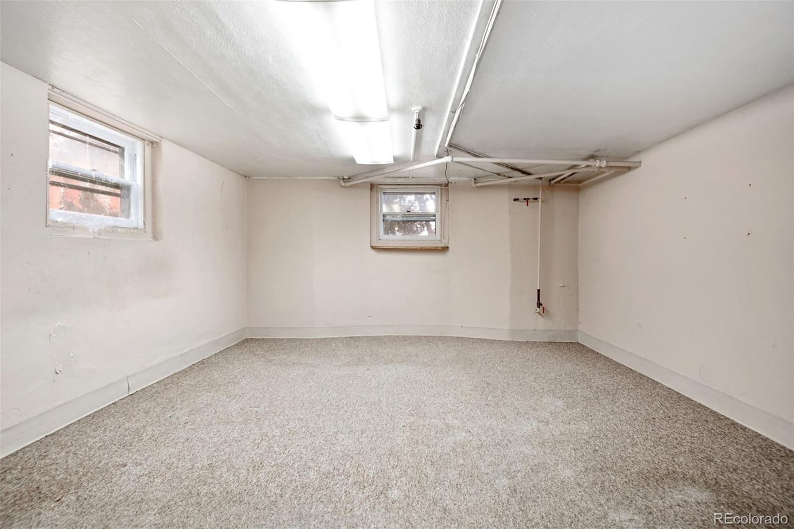 303 South 3rd Street Sterling, CO 80751 - Photo 48 of 50 en empty room with windows