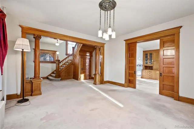 a view of a room with large windows