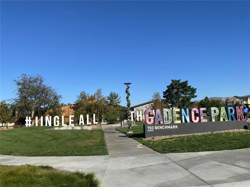 114 Spiral Irvine, CA 92618 - Photo 13 of 15 a sign that is on the side of a road