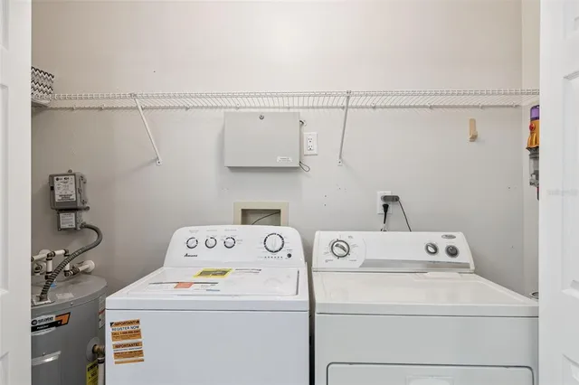 a utility room with dryer and washer