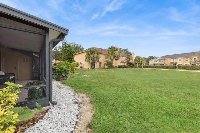 a view of a back yard of the house