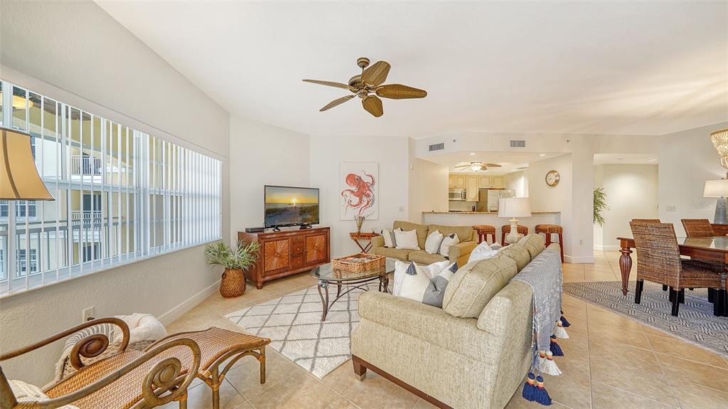 14041 Bellagio Way, Unit 316 Osprey, FL 34229 - Photo 16 of 74 a living room with furniture