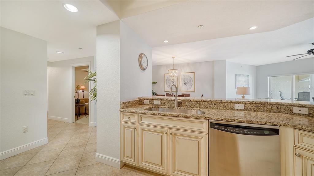 14041 Bellagio Way, Unit 316 Osprey, FL 34229 - Photo 22 of 74 a bathroom with a sink and a mirror