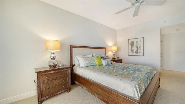 a bedroom with a bed and a dresser in it