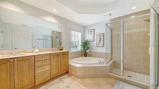 a bathroom with a sink and cabinets