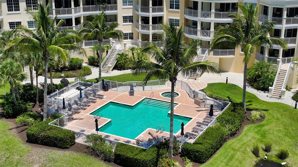 14041 Bellagio Way, Unit 316 Osprey, FL 34229 - Photo 47 of 74 an aerial view of a house with garden space and lake view