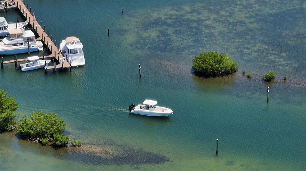 14041 Bellagio Way, Unit 316 Osprey, FL 34229 - Photo 63 of 74 a front view of a house with a yard