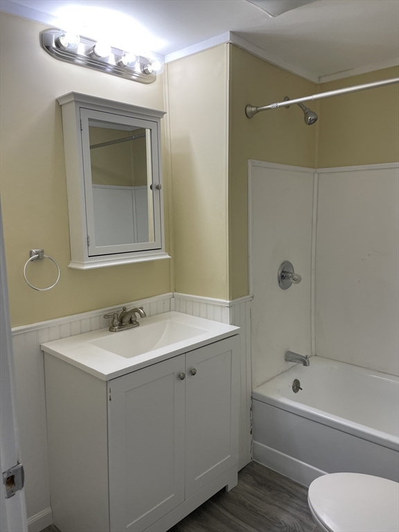 136 Brookside Road Orange, MA 01364 - Photo 10 of 10 a bathroom with a toilet sink vanity tub and mirror