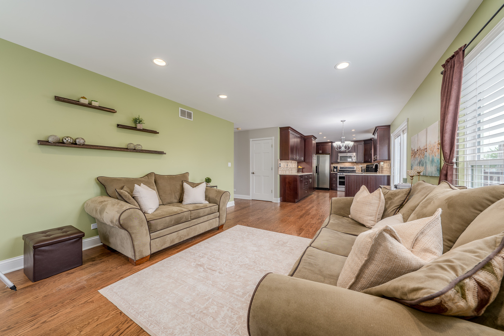 2040 Garfield Avenue Aurora, IL 60506 - Photo 11 of 32 a living room with furniture and a large window