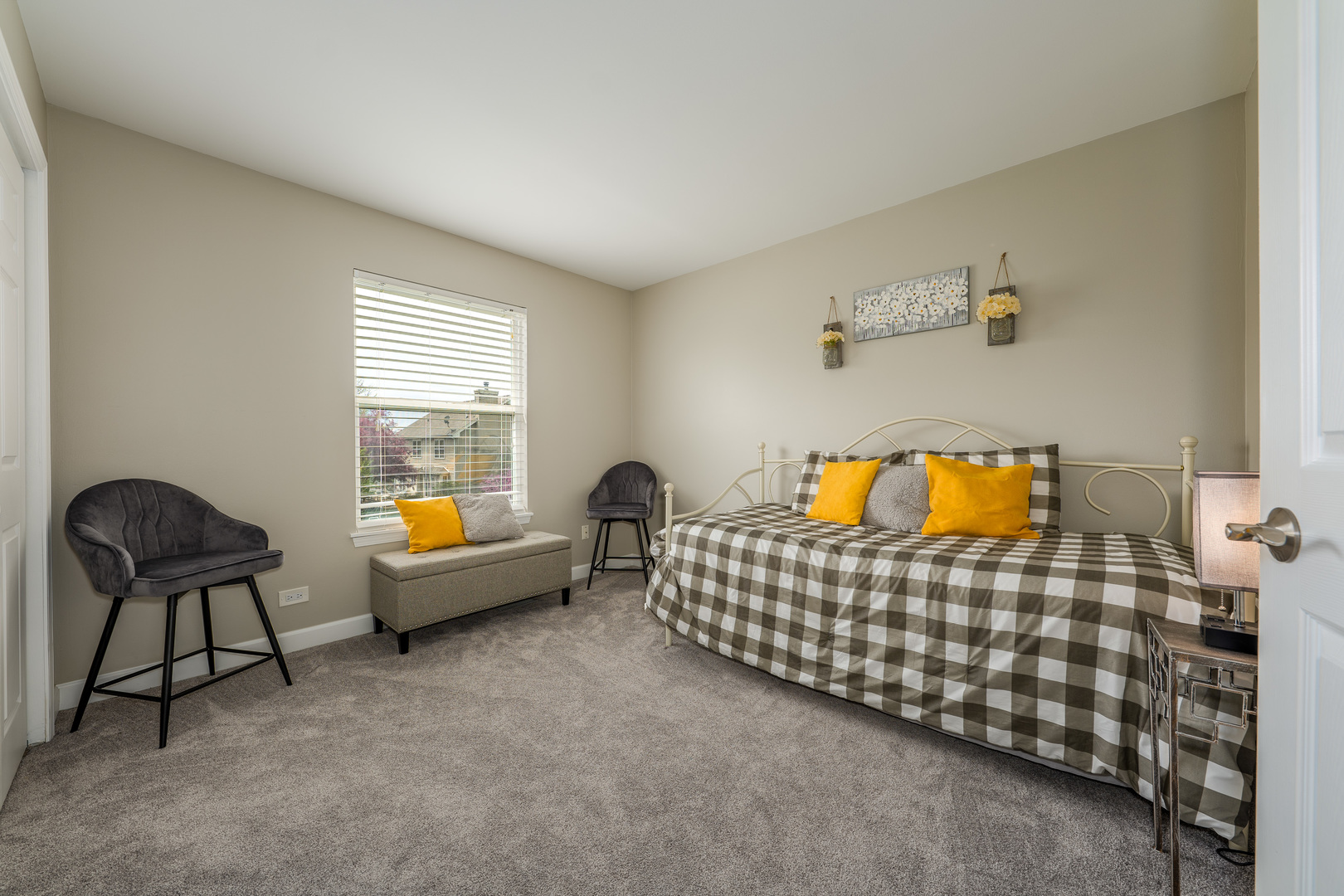 2040 Garfield Avenue Aurora, IL 60506 - Photo 17 of 32 a bedroom with a bed and a chair