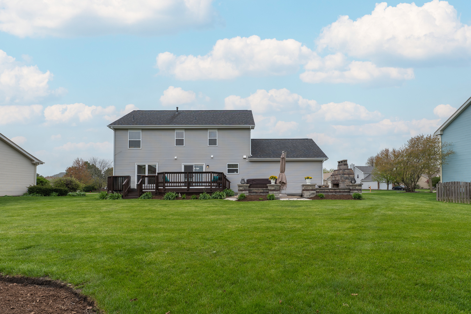 2040 Garfield Avenue Aurora, IL 60506 - Photo 31 of 32 a view of a house with a yard and sitting area