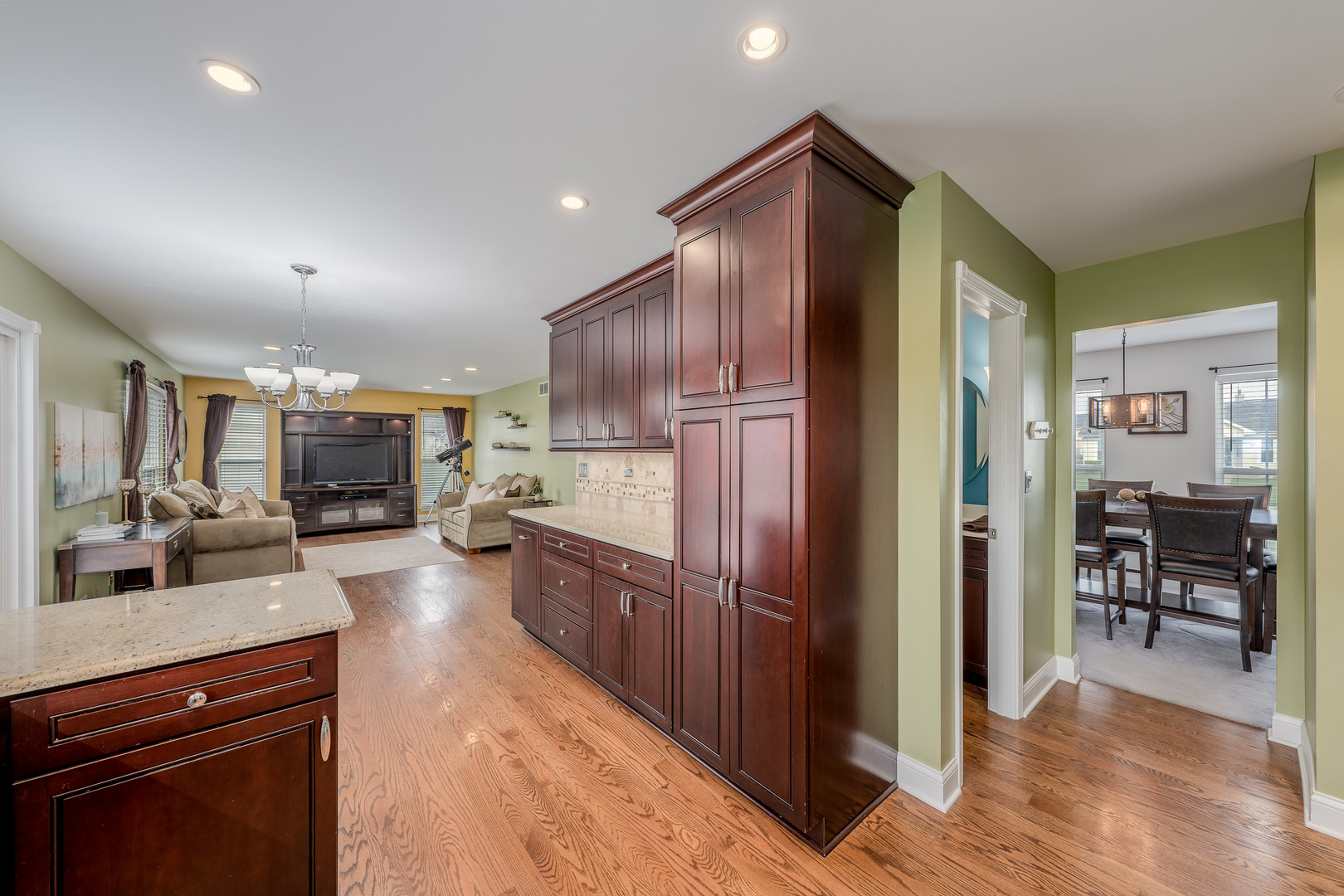 2040 Garfield Avenue Aurora, IL 60506 - Photo 7 of 32 a kitchen with kitchen island a counter top space a sink stainless steel appliances and cabinets