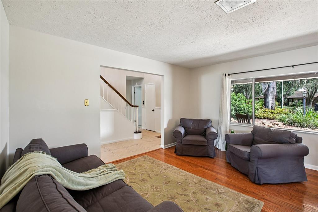 19254 Blount Road Lutz, FL 33558 - Photo 14 of 35 a living room with furniture and a large window
