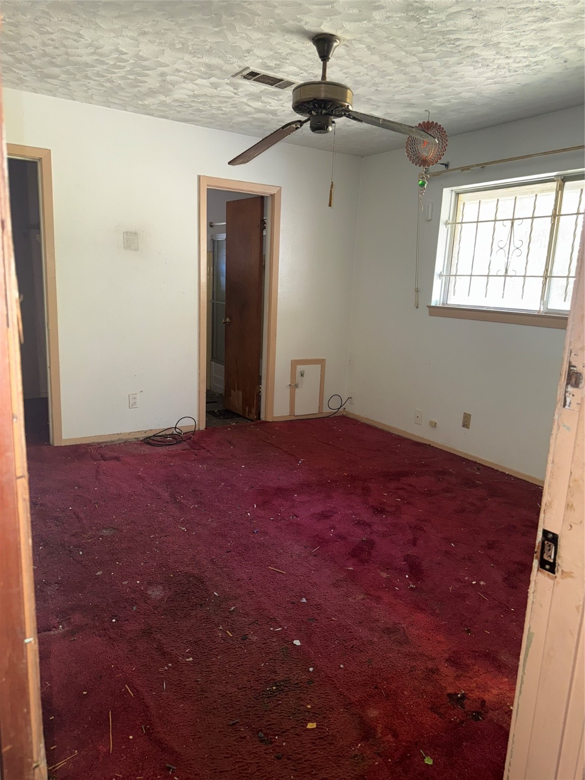 7705 Yoe Street Houston, TX 77016 - Photo 8 of 9 en empty room with windows