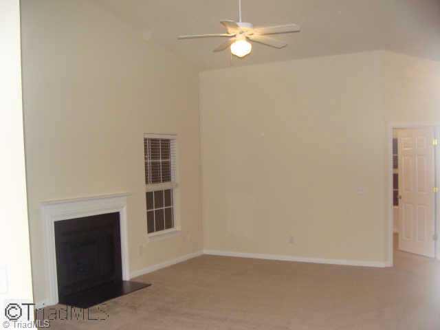 2910 WaterStone Loop High Point, NC 27265 - Photo 2 of 9 Other. Huge living room with fireplace, vaulted ceilings. This room includes new carpet. Big enough for this biggest living room furniture.