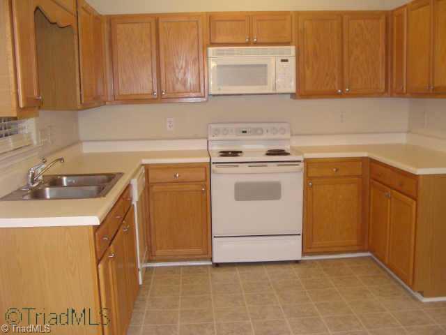 2910 WaterStone Loop High Point, NC 27265 - Photo 6 of 9 Other. Very nice kitchen with dishwasher, built in microwave and lots of cabinet and counter space.