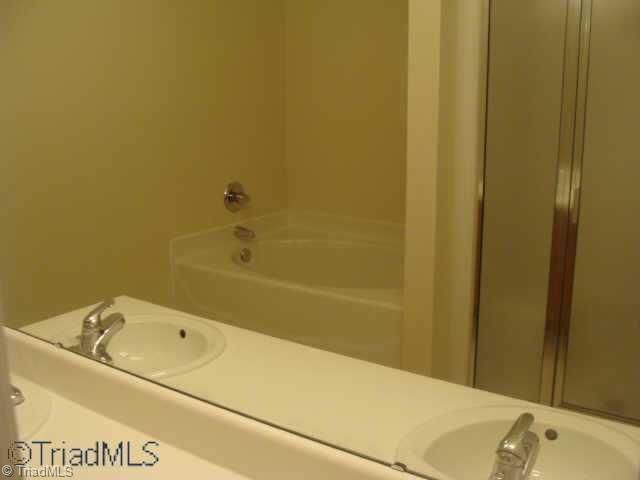 2910 WaterStone Loop High Point, NC 27265 - Photo 8 of 9 Other. Master bath includes double vanity sinks, garden tub and seperate shower. Cant get this anywhere else in this price range.