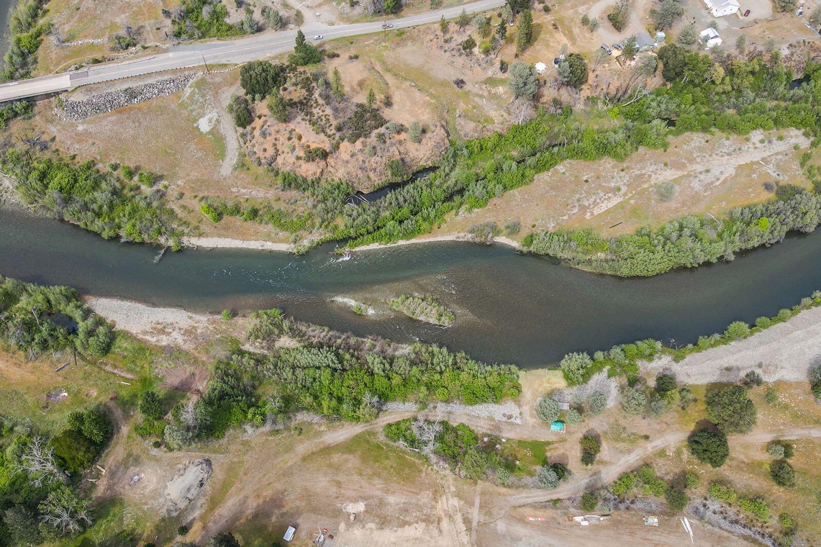 710 Dutch Creek Road Junction City, CA 96048 - Photo 10 of 38 a view of a lake from a yard