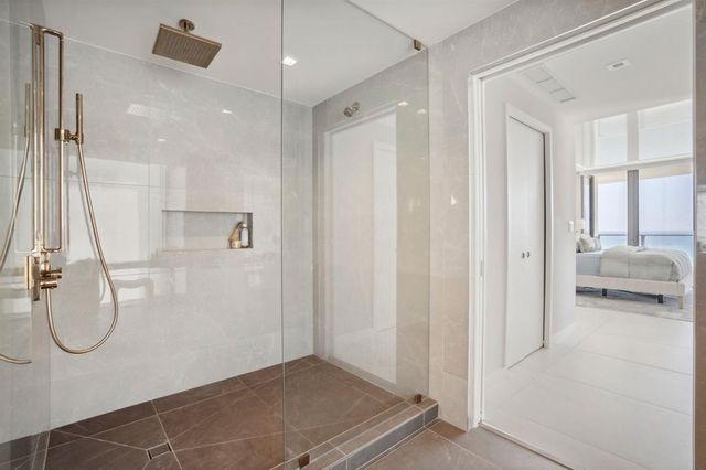 a view of a balcony with an ocean view