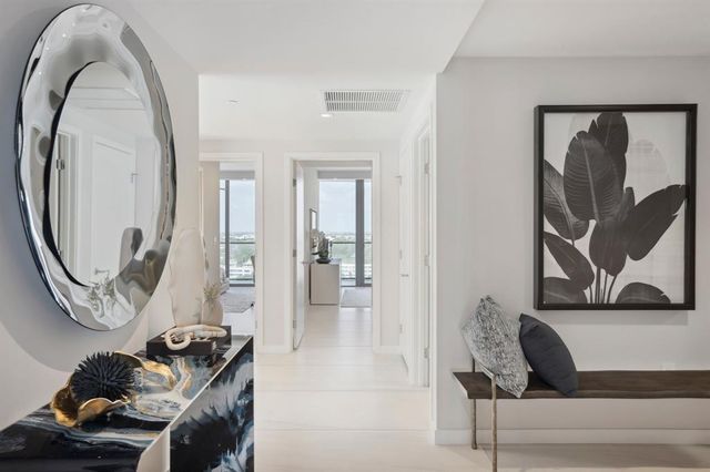 a spacious bedroom with a bed and window