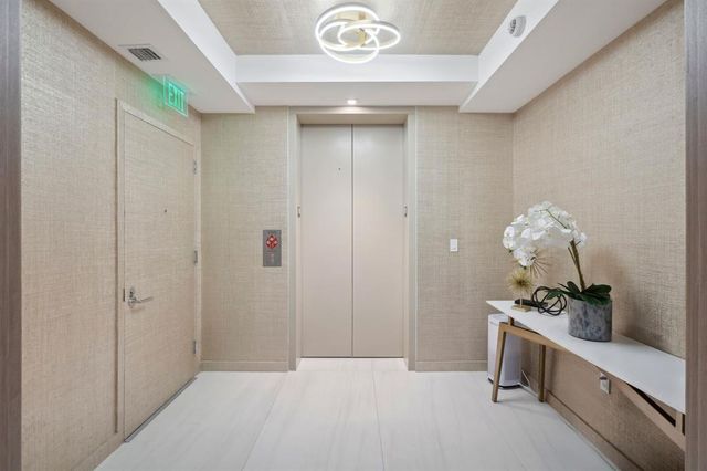 a bathroom with a shower and a toilet