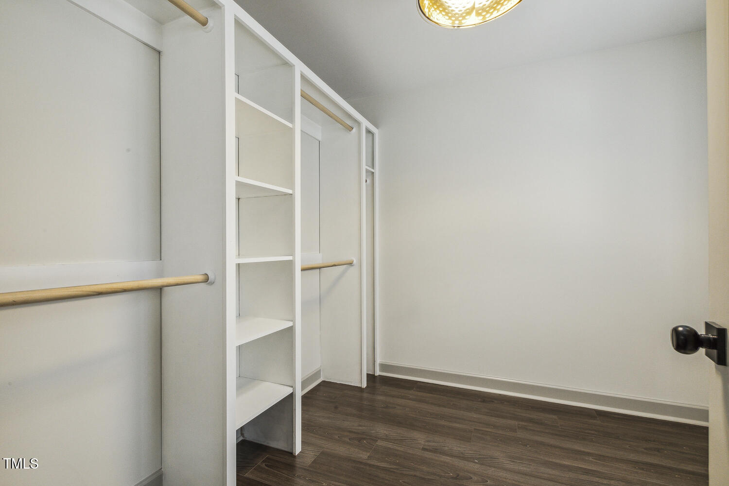 5402 Goldenglow Way Raleigh, NC 27606 - Photo 25 of 44 a view of an empty walk in closet