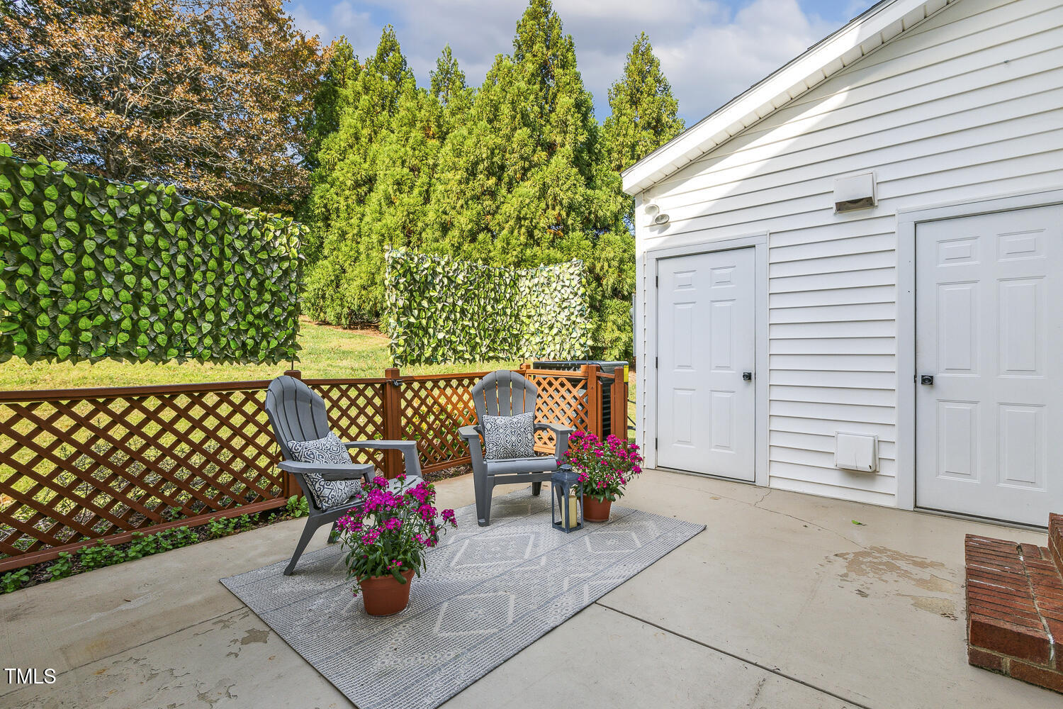 5402 Goldenglow Way Raleigh, NC 27606 - Photo 38 of 44 a view of a terrace with sitting area