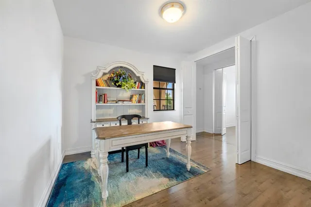 a workspace with furniture and window