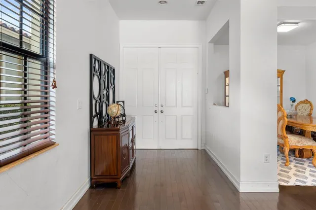 a view of a storage & utility room with closet window