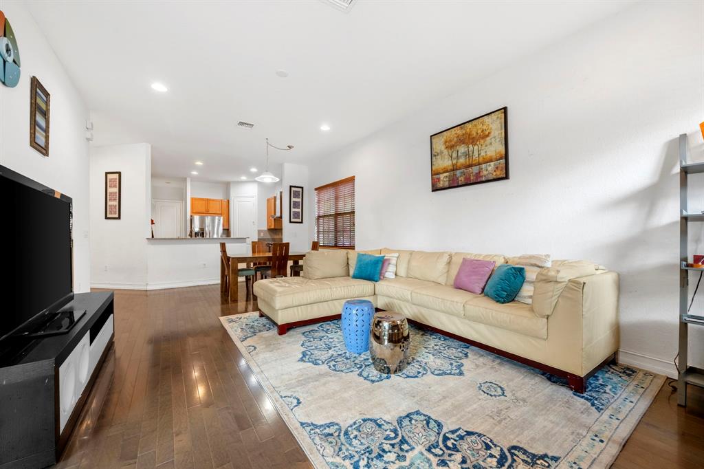 7302 Northwest 111th Way Parkland, FL 33076 - Photo 9 of 36 a living room with furniture and a flat screen tv