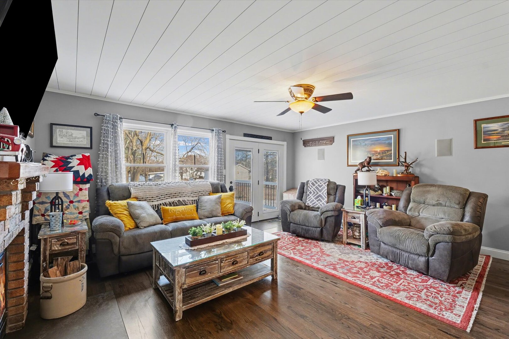 808 South Spring Lake Road Mahomet, IL 61853 - Photo 19 of 37 a living room with furniture and a chandelier