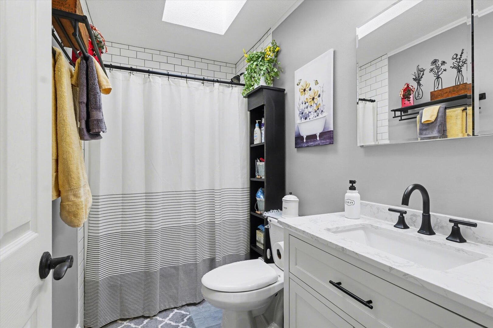 808 South Spring Lake Road Mahomet, IL 61853 - Photo 21 of 37 a bathroom with a sink toilet and shower