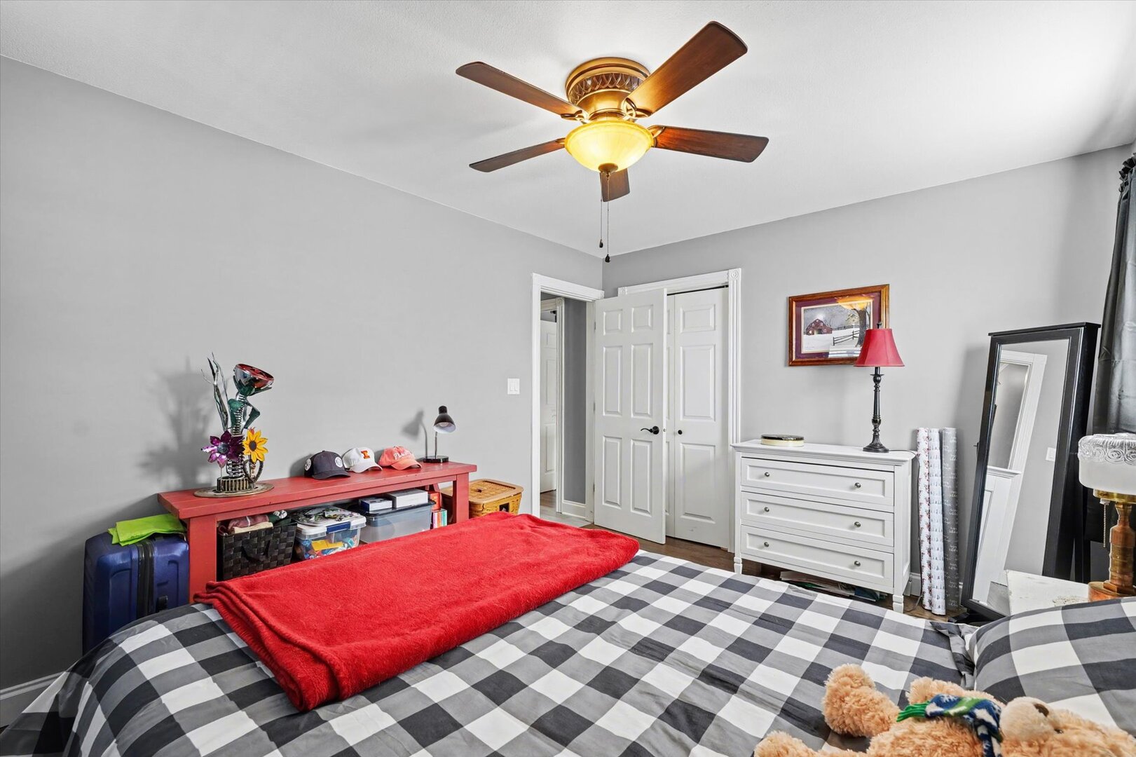 808 South Spring Lake Road Mahomet, IL 61853 - Photo 26 of 37 a bedroom with a bed and a chandelier