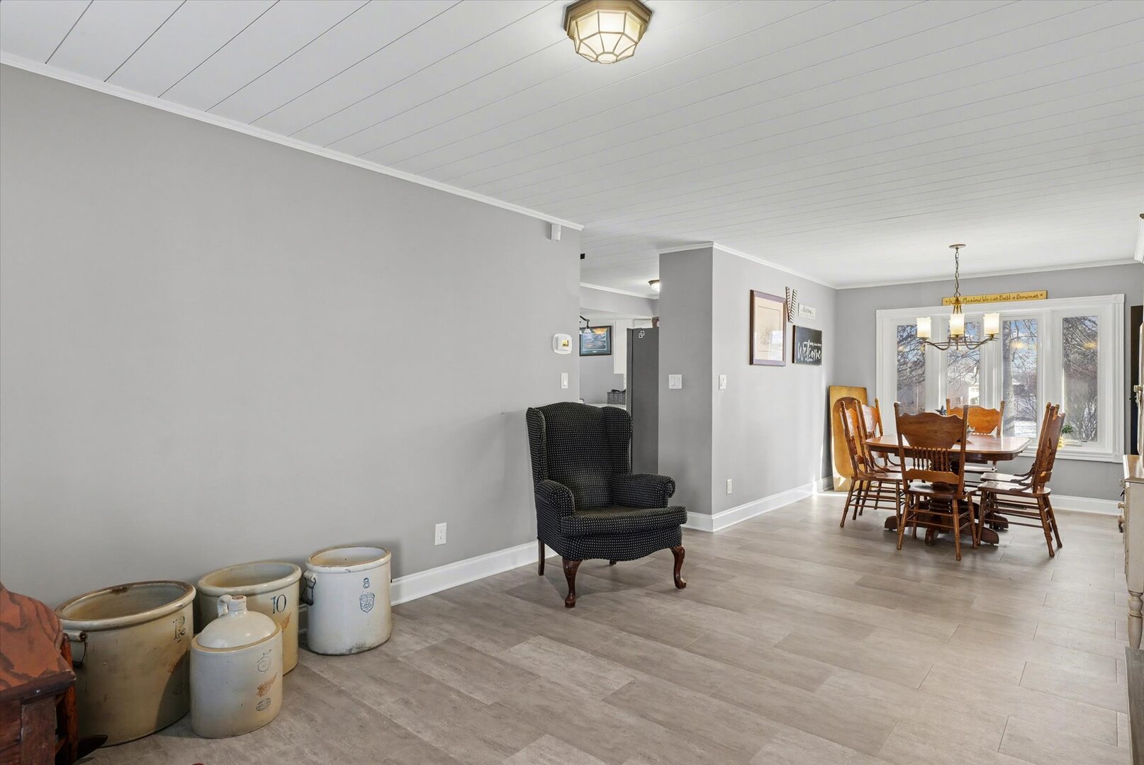 808 South Spring Lake Road Mahomet, IL 61853 - Photo 5 of 37 a view of a workspace with furniture and a potted plant
