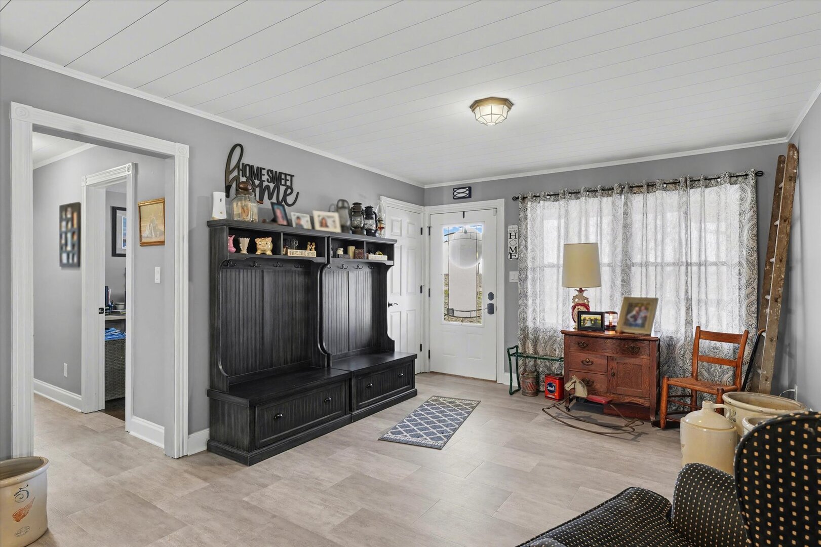 808 South Spring Lake Road Mahomet, IL 61853 - Photo 7 of 37 a living room with furniture and a window