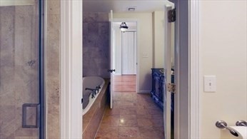 8 Brandley Road, Unit SF Watertown, MA 02472 - Photo 18 of 25 a bathroom with a tub