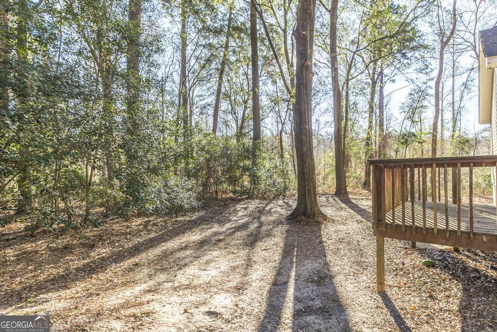 411 Cypress Drive Dublin, GA 31021 - Photo 31 of 31 a view of porch with a yard