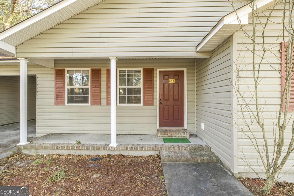 411 Cypress Drive Dublin, GA 31021 - Photo 6 of 31 a front view of a house