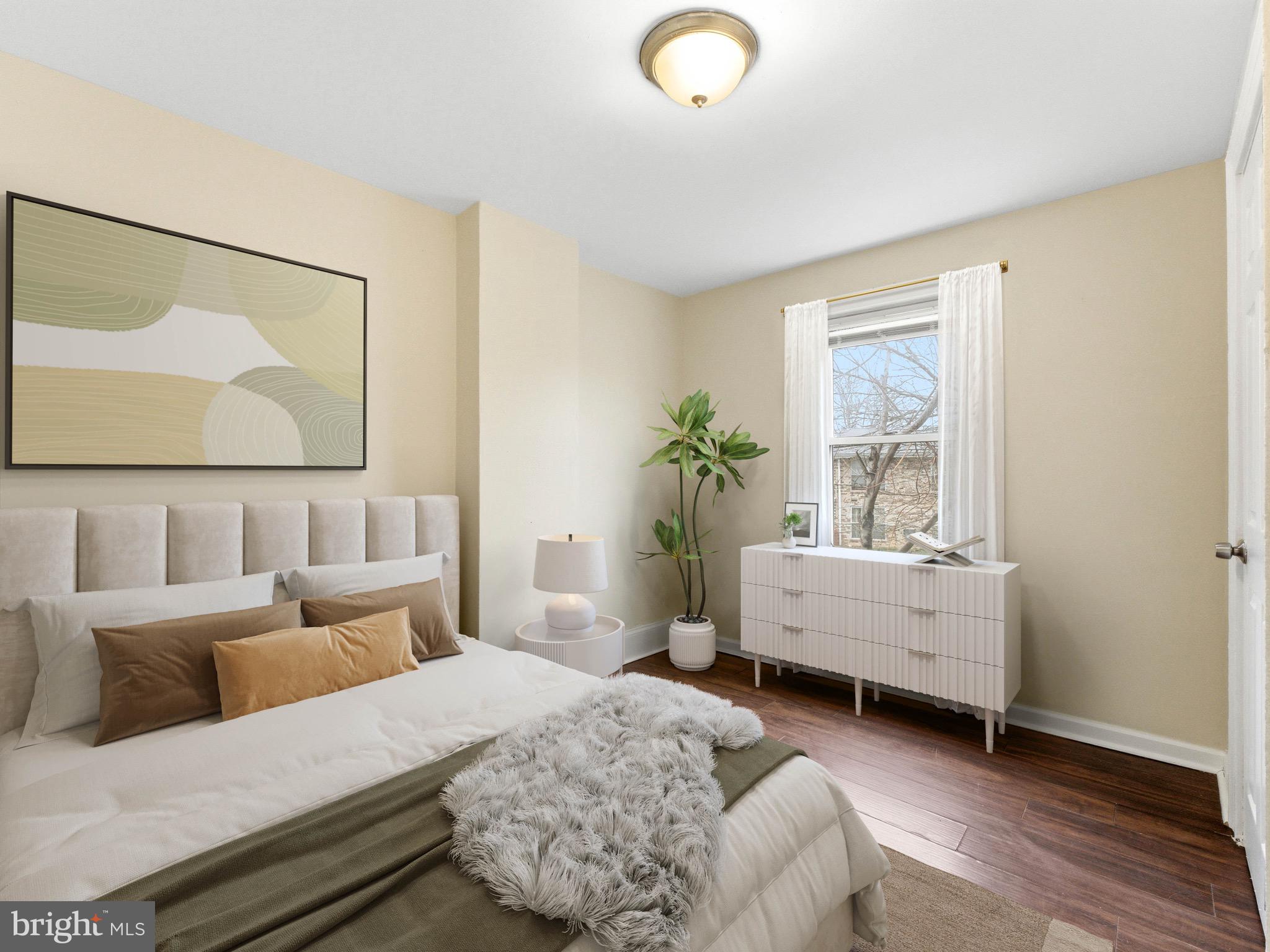 2976 North Congress Road Camden, NJ 08104 - Photo 16 of 25 a living room with furniture and a large window