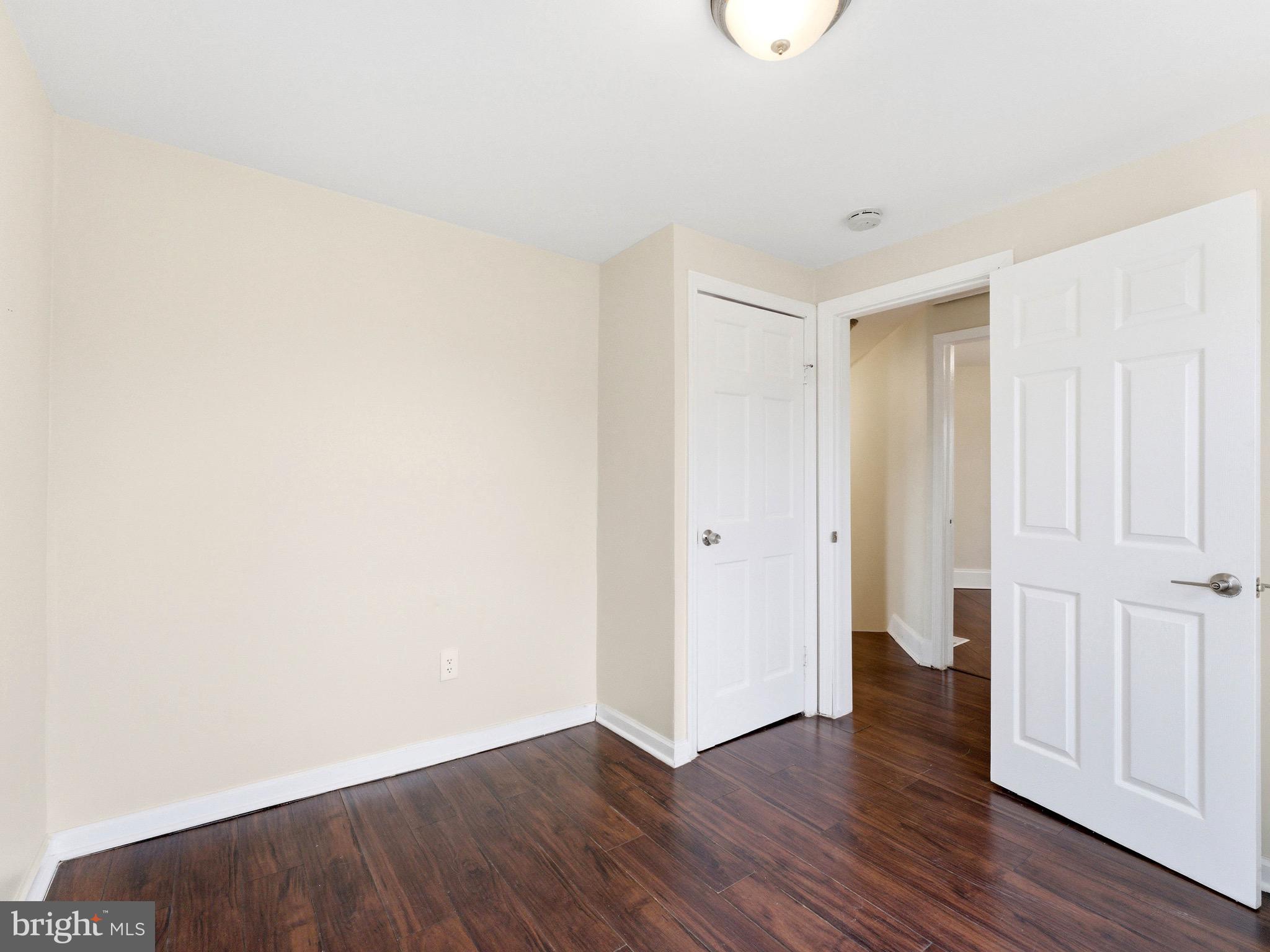 2976 North Congress Road Camden, NJ 08104 - Photo 19 of 25 a view of an empty room with wooden floor