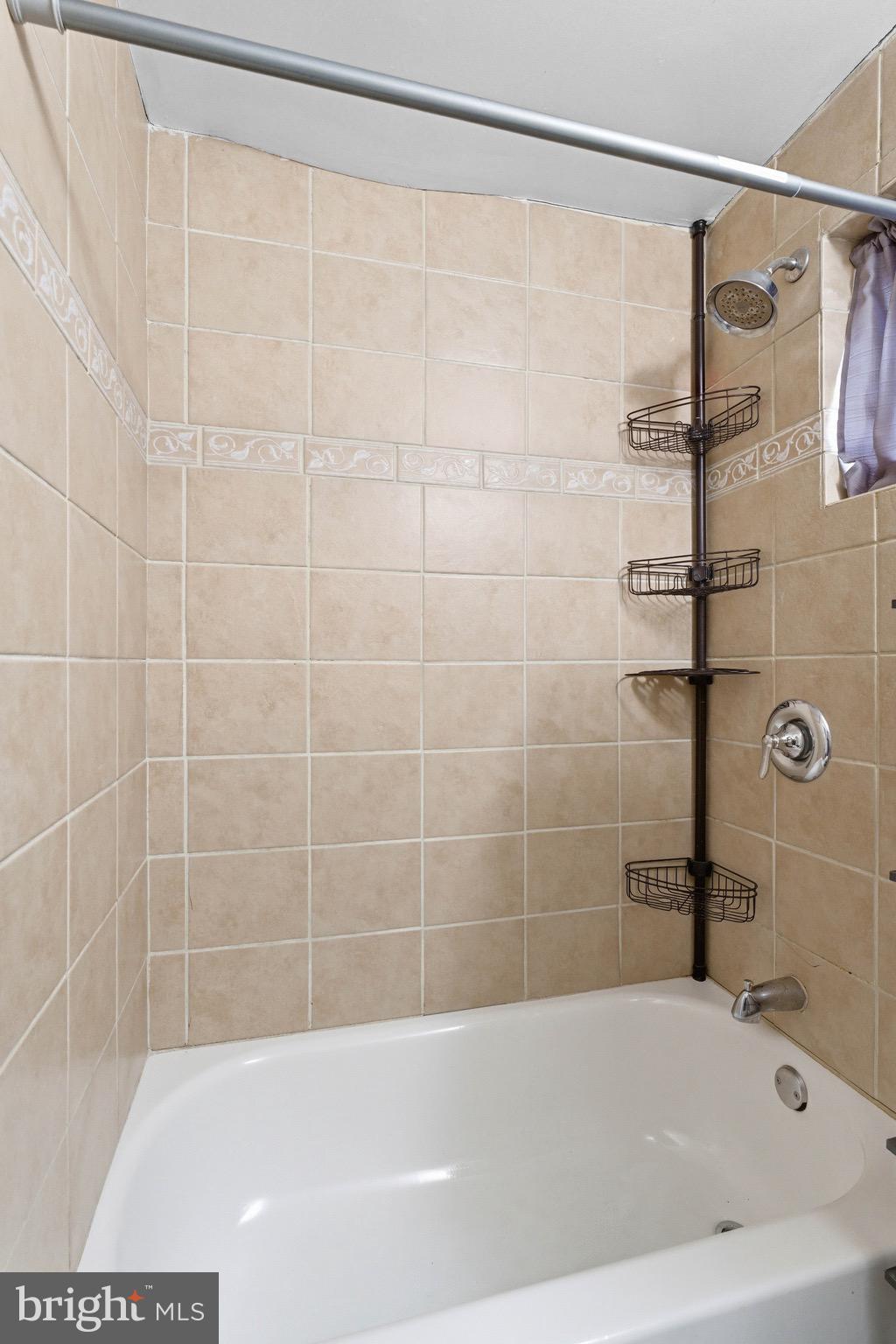 2976 North Congress Road Camden, NJ 08104 - Photo 23 of 25 a bath tub sitting next to a shower