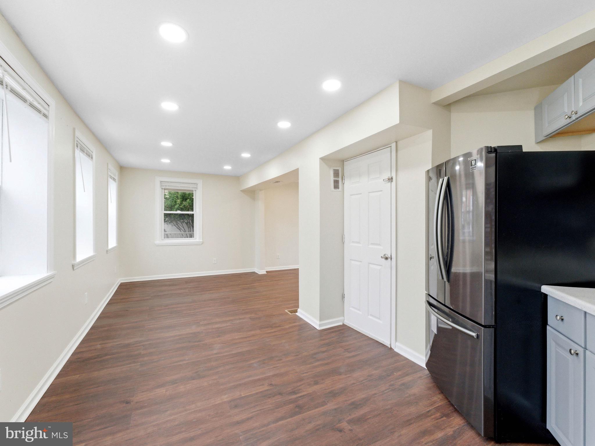 2976 North Congress Road Camden, NJ 08104 - Photo 9 of 25 a view of a kitchen with a refrigerator and a window