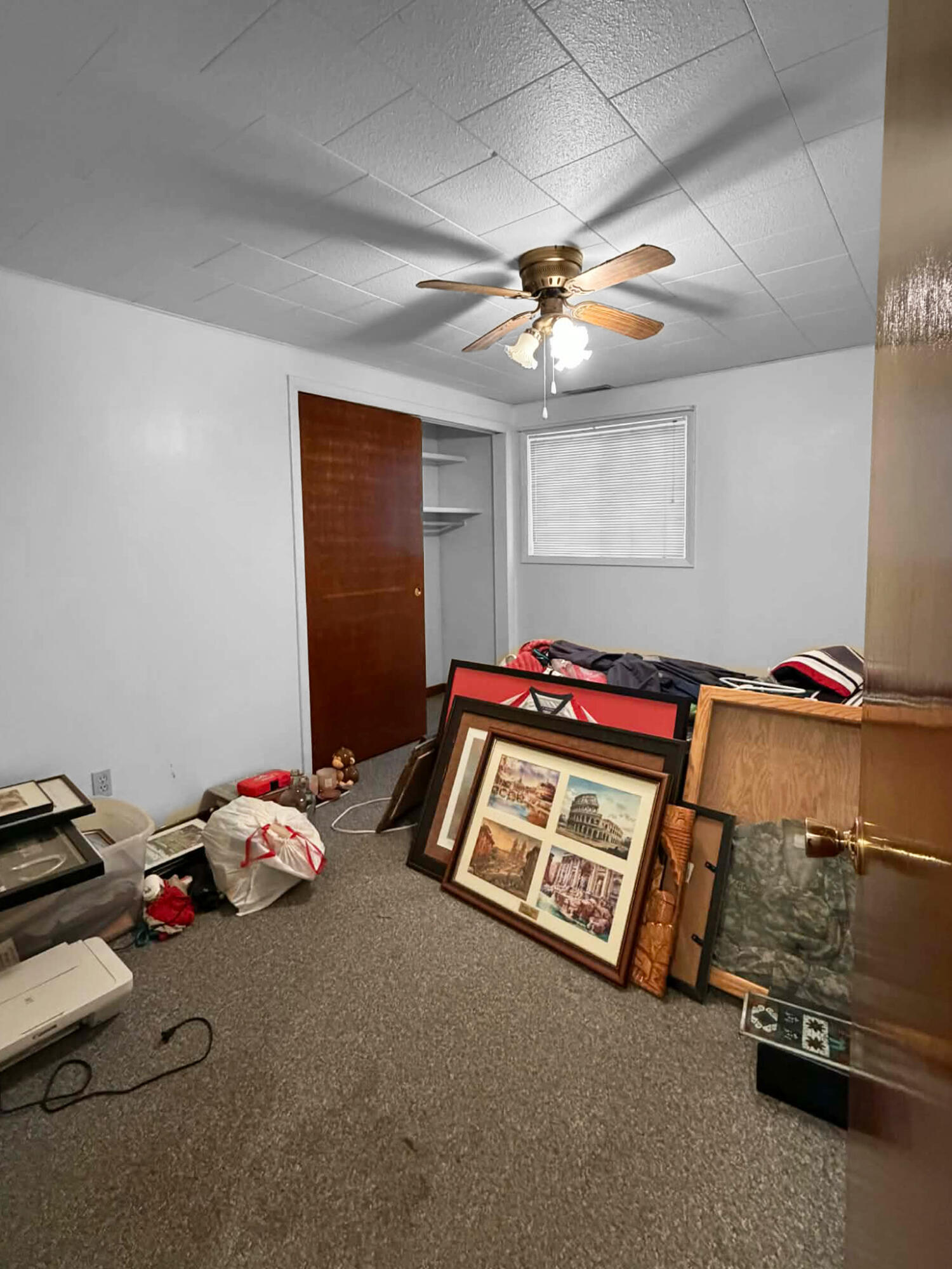 710 West Charles Street Rensselaer, IN 47978 - Photo 13 of 16 a bedroom with a bed and a chandelier