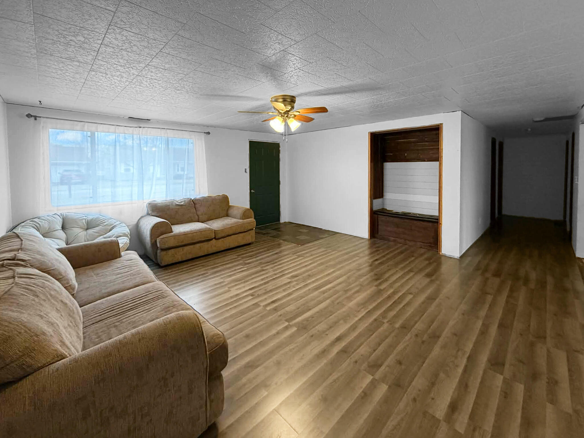 710 West Charles Street Rensselaer, IN 47978 - Photo 4 of 16 a living room with furniture and wooden floor