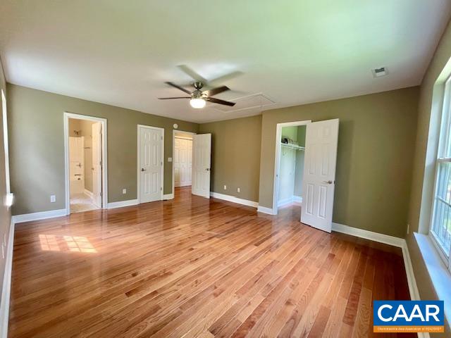 5420 Cove Garden Road Covesville, VA 22931 - Photo 13 of 27 a view of an empty room with window and wooden floor