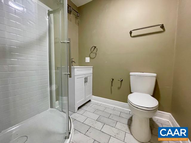 5420 Cove Garden Road Covesville, VA 22931 - Photo 20 of 27 a bathroom with a toilet and a shower