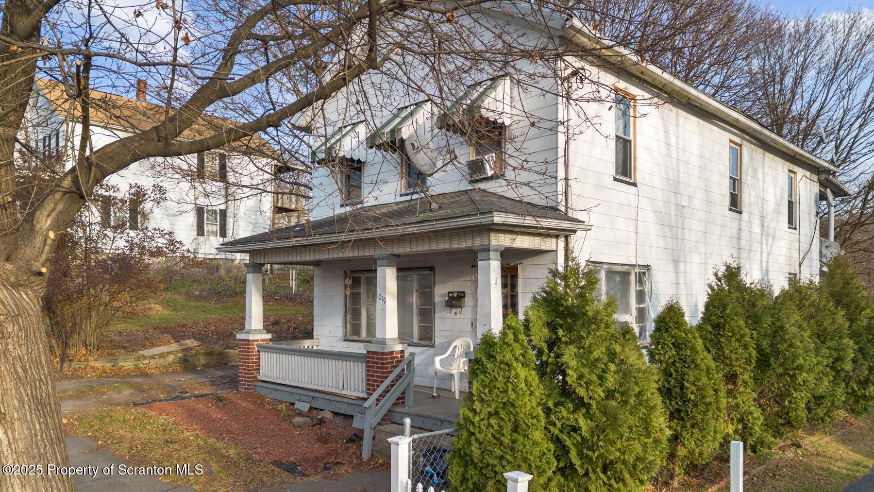 1019 South Webster Avenue Scranton, PA 18505 - Photo 2 of 36 a view of house with backyard and outdoor seating