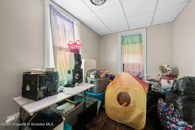 a room with furniture and window