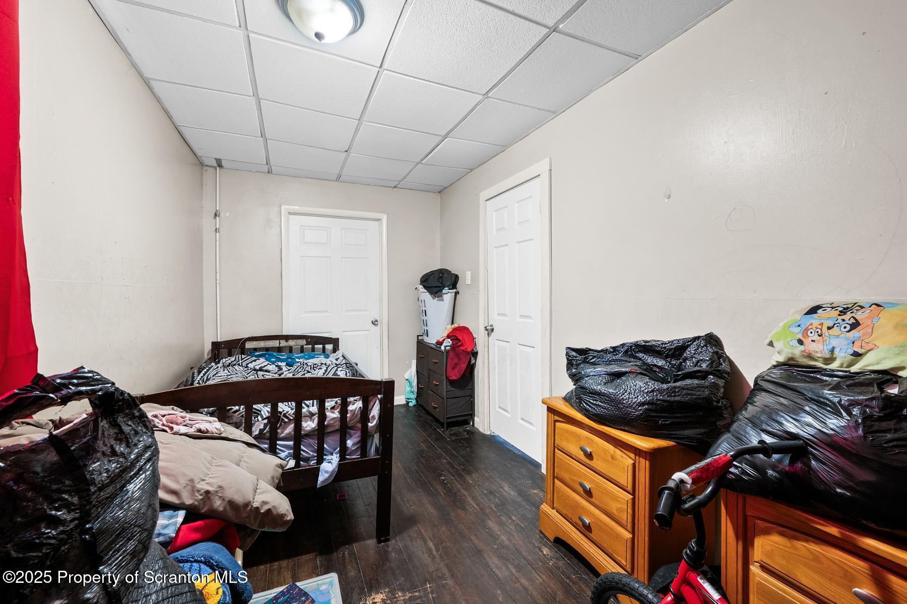 1019 South Webster Avenue Scranton, PA 18505 - Photo 25 of 36 a bedroom with furniture and a bed